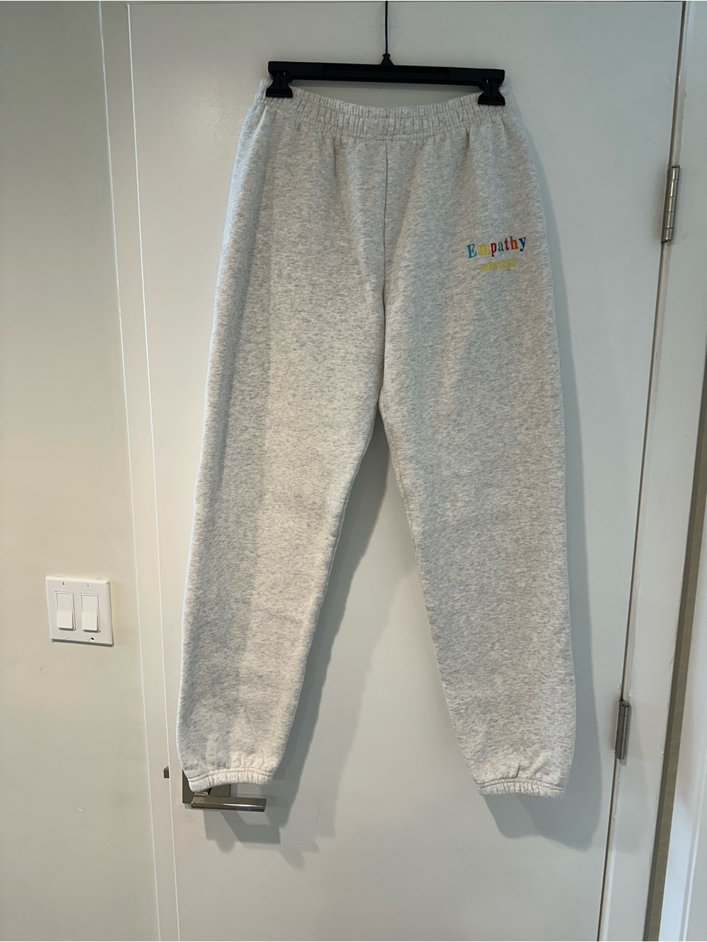 Mayfair Group 'Empathy Always' Embroidered Joggers